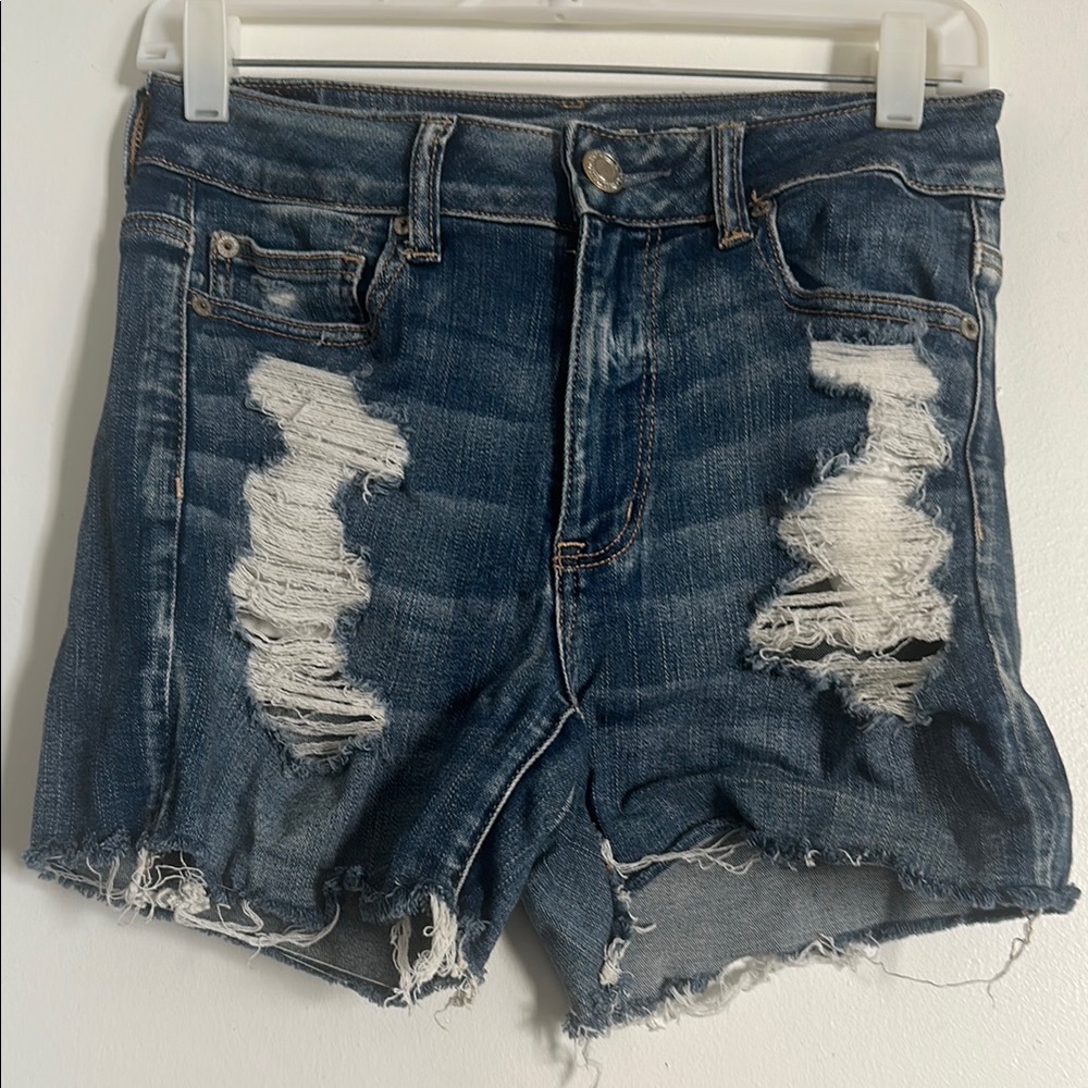 EUC American Eagle Next Level Stretch Blue Distressed Jean Shorts with Raw Hem - Picture 2 of 5